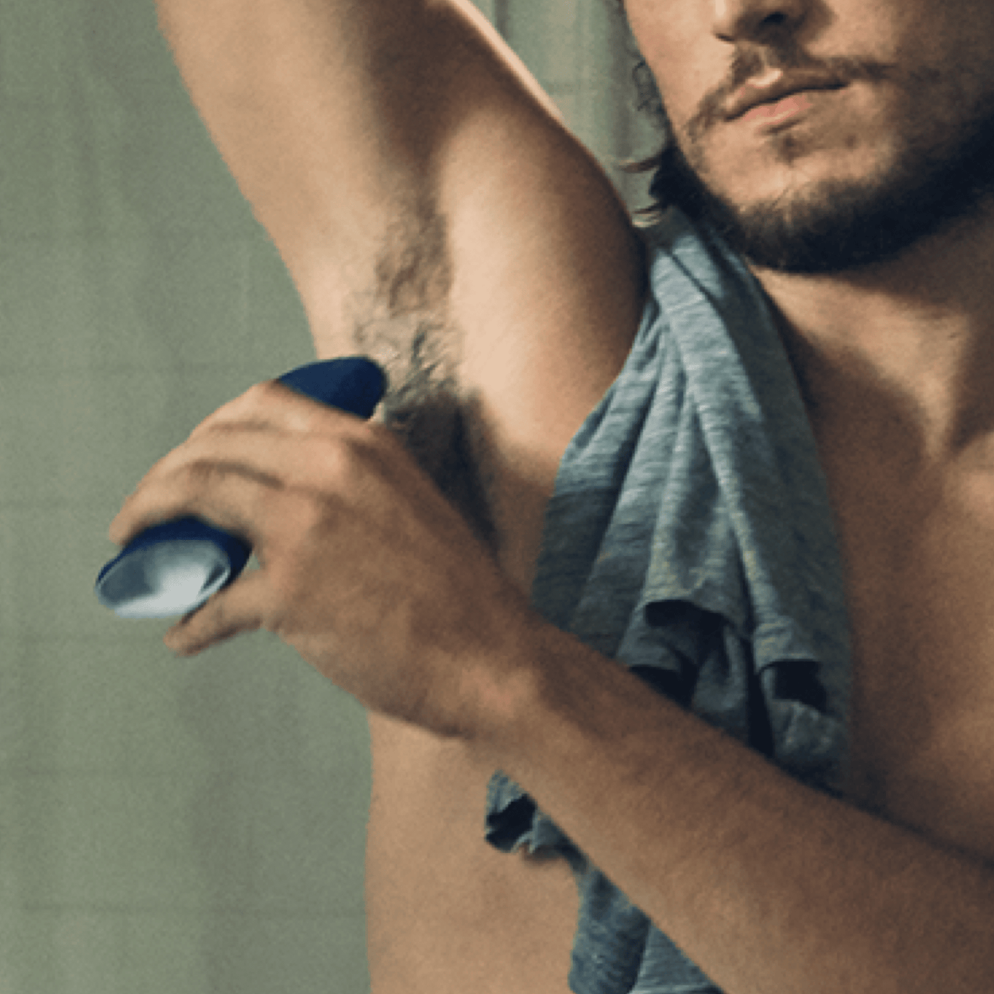 Dollar Shave Club Deodorant in use.