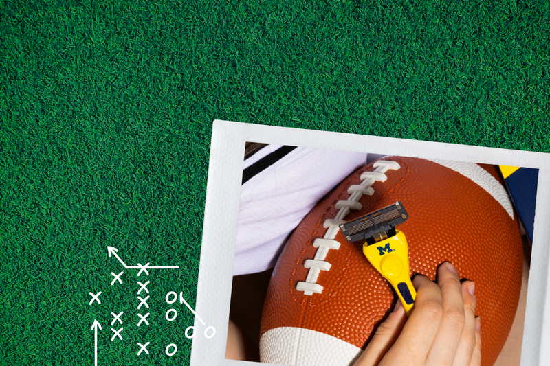 Football with a razor blade on a green field with football play diagram