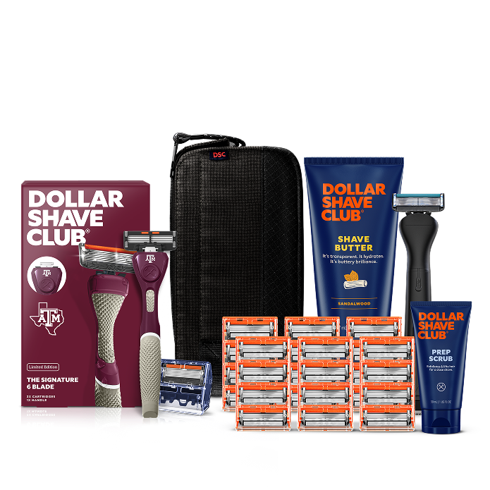 Dollar Shave Club Texas A&M University grooming kit on a white background. Includes a maroon razor handle with the Aggies logo, 24 blades, Shave Butter, Prep Scrub, a black 3-in-1 electric trimmer, and a black traveler case.